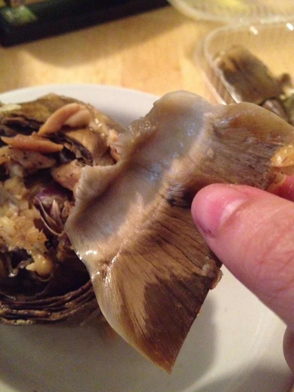 I like mine as is but you can dip the leaves in butter or aioli.