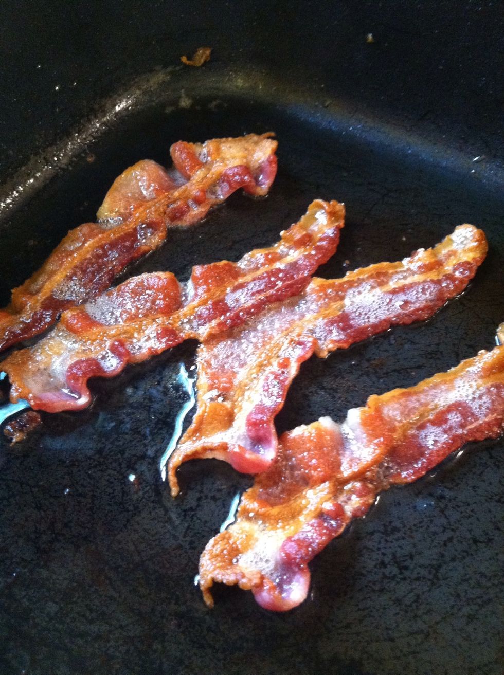 I like mine crispy. You can cook your bacon the way you like it. After your bacon is cooked take it out for later use. Use your bacon oil to cook the rest of your sprouts.