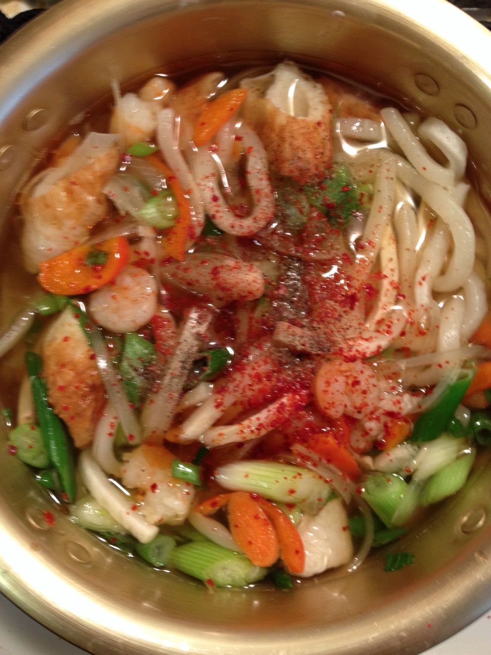 I like my noodle always spicy so I'm going to put some black pepper, and red pepper powder.