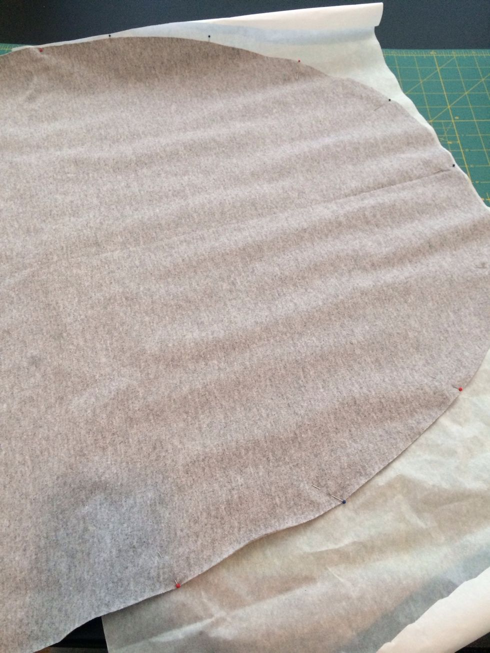 I like the Heat & Bond better but whatever gets the trick done is fine and this process is the same either way. Pin out your adhesive paper and then trim the edges.