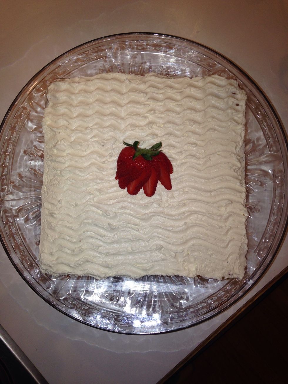 I like the wavy pattern and then garnished with a strawberry fan.