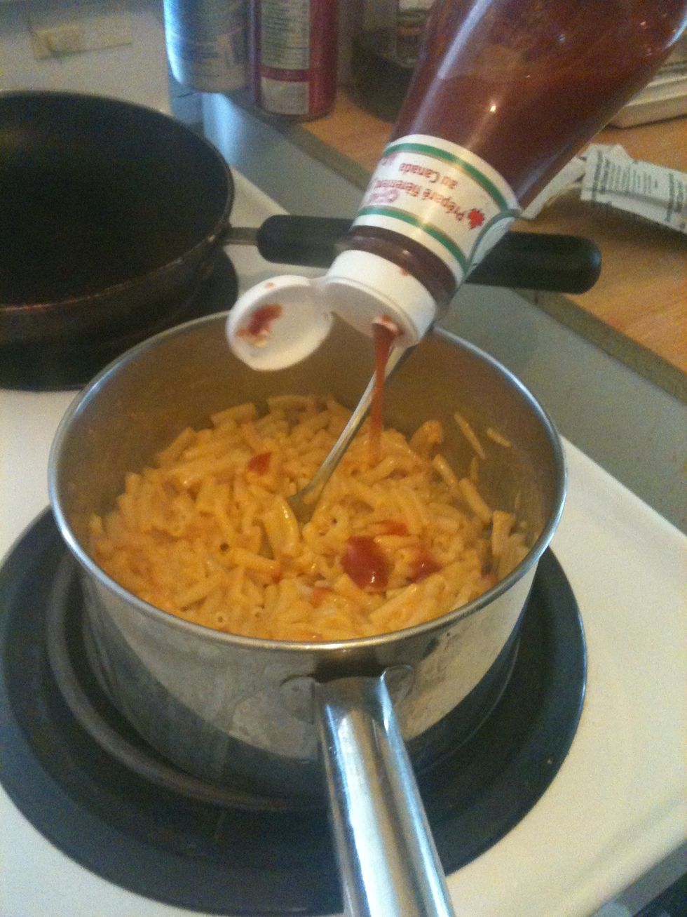 I like to add ketchup to the Mac and cheese sauce, you don't have to if you don't want to. Make sure it is thick so that it holds together in the sandwich.