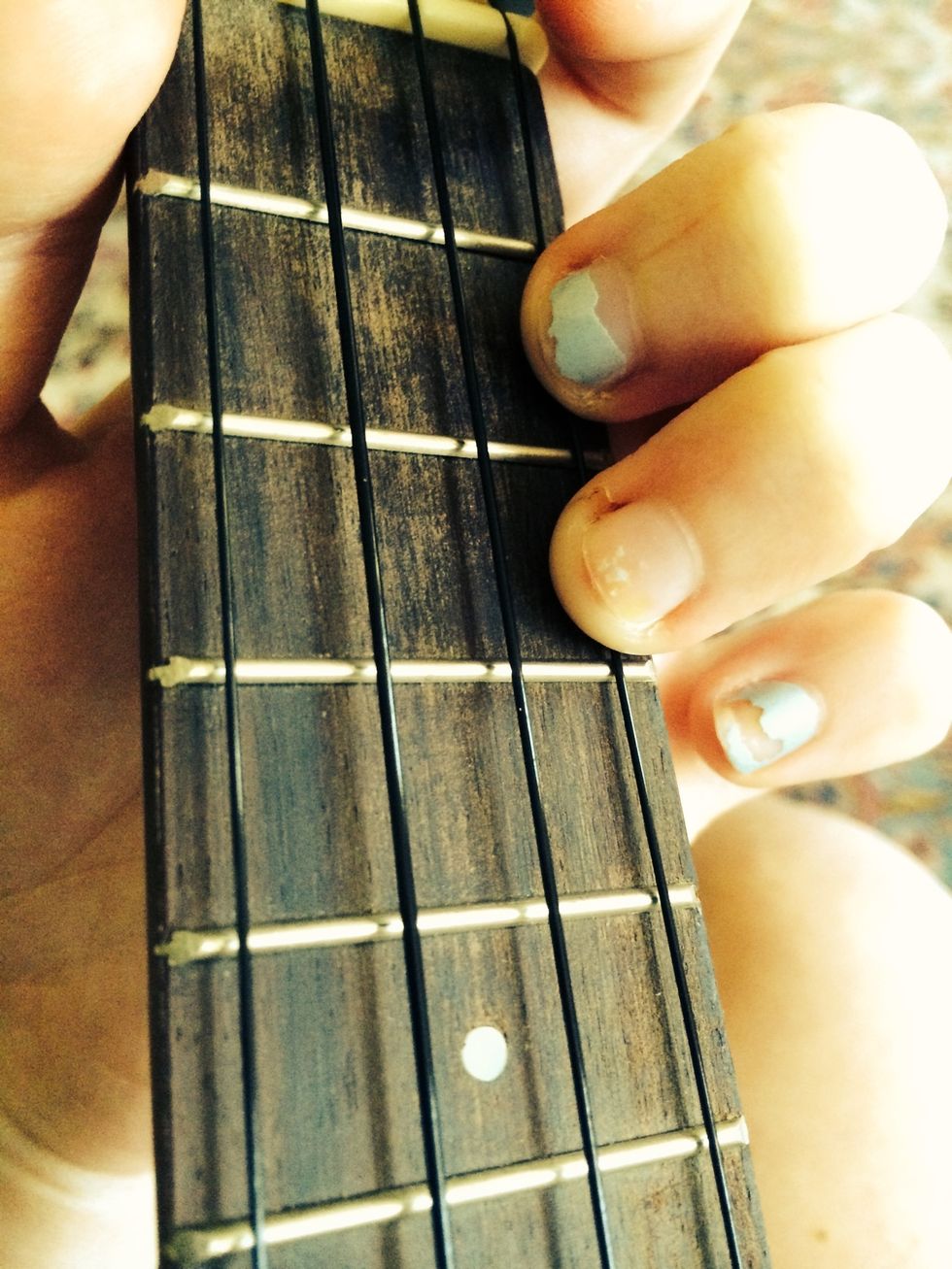 I like to add my 2nd finger on the same string to make the transition to the next chord easier.