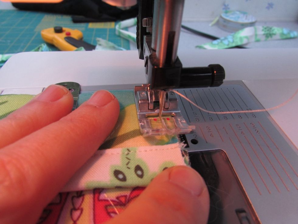 I like to baste stitch the ends of this pocket, just a 1/4" from each edge.