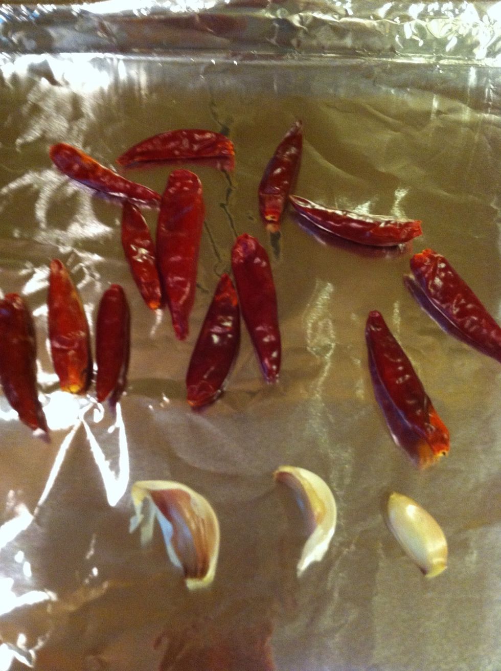I like to broil my chiles and garlic 1st. I usually broil 30 sec's to a min on each side for the chilies. Keep an eye on them they burn easily.