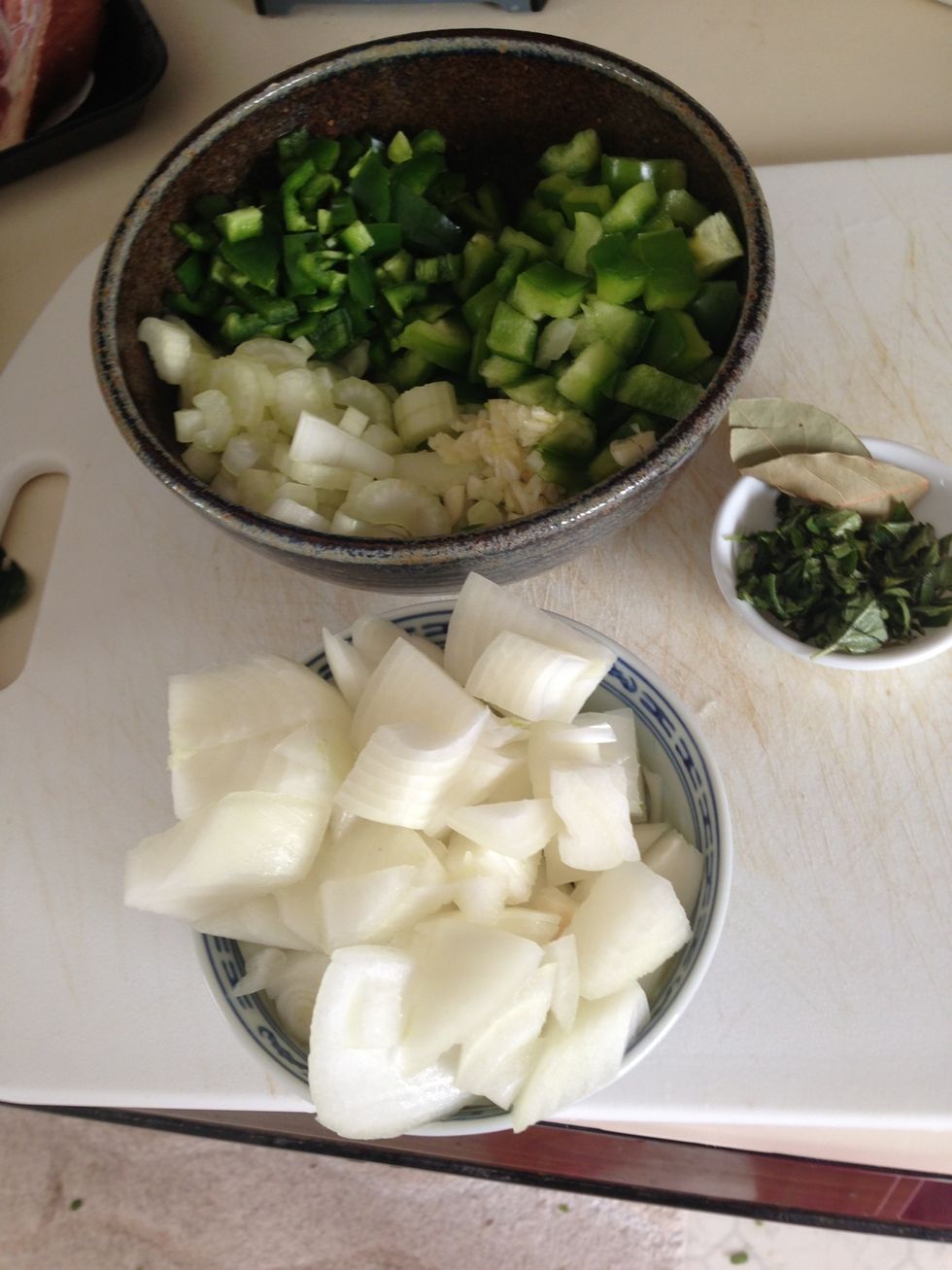 I like to chop everything up and sort it into bowls according to how it will be added later. It really cuts down on the panic snowball.