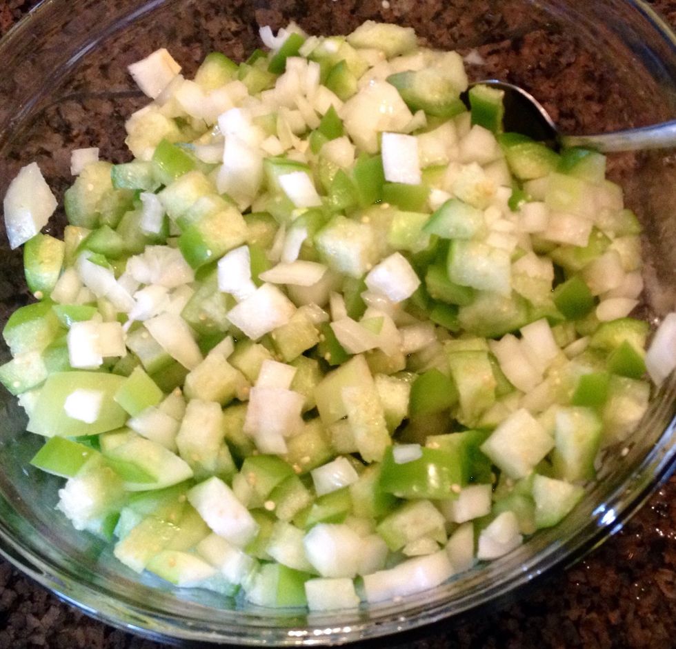 I like to dice up the onions and tomatillos, while the chicken is cooking, because I start cooking the soup stock, before the chicken is tender and ready to go into the soup.
