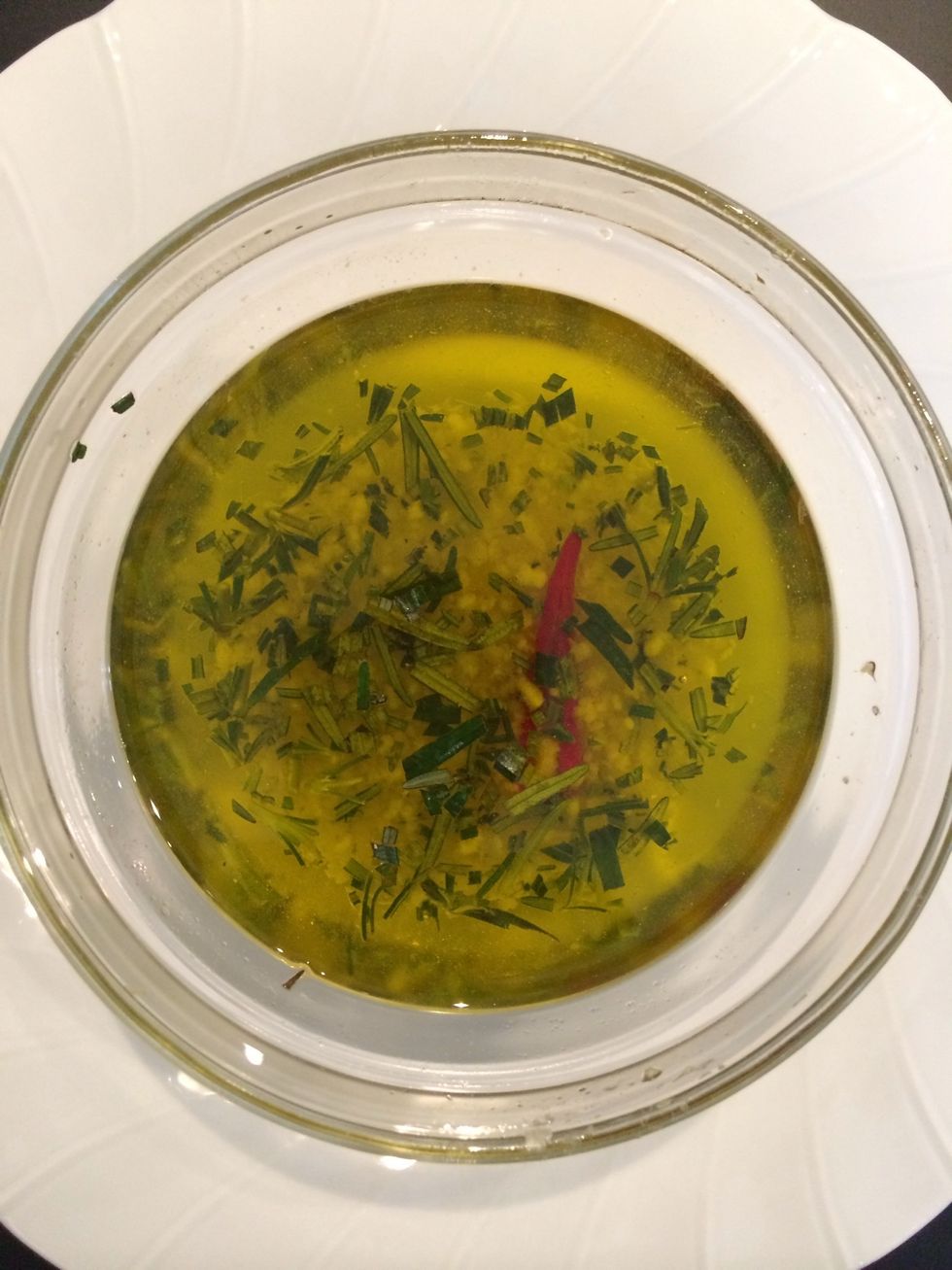 I like to flavor the oil but it is up to each person to go beyond the basic recipe. I like to add garlic, pepperoncini (chili) and rosemary.