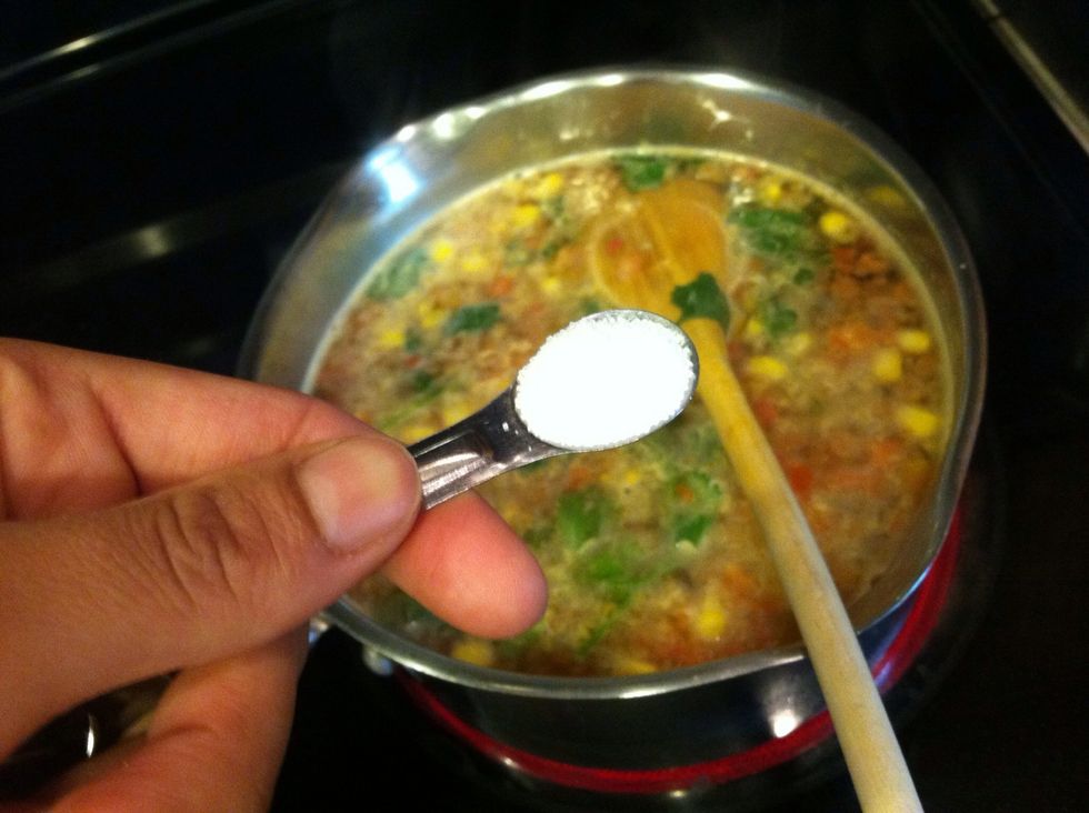 I like to let it cook about 10 minutes because I want the rice to cook through most of the way before I add the veggies. After 10 mins I add the corn, carrots, and potatoes. Add your salt