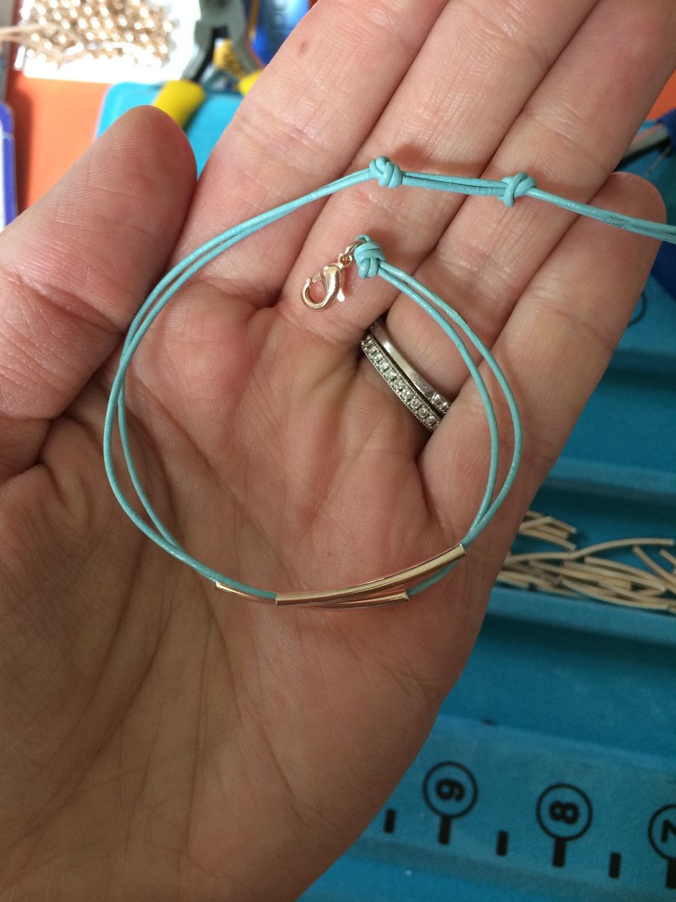 I like to make two knots (same as the one made with the clasp) so I can have two different sizes.