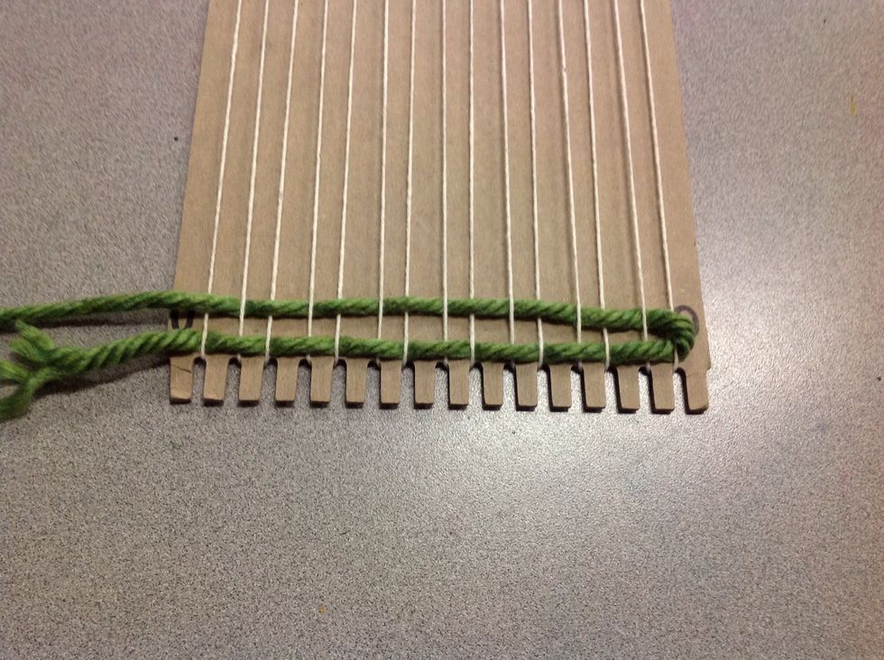 I like to pick up every other string and tuck my weft under it. The "over" takes care of itself. The "under" you have to make happen.