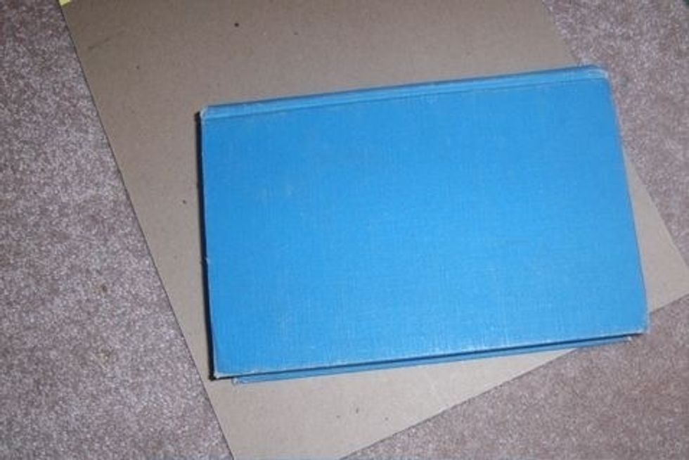 I like to place a heavy book over the card to make sure it lies flat. You may or may not need to do this- just go by whether or not the card is lying flat on its own.