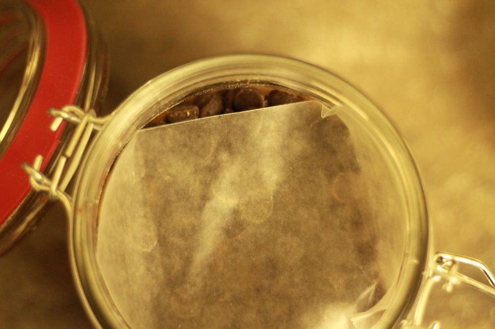 I like to put a square of wax paper on top of the layer of chocolate chips ( optional)