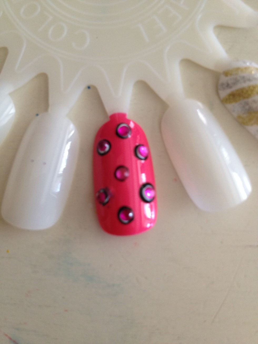 I like to put little gems inside of the white dots but that's totally optional!(: