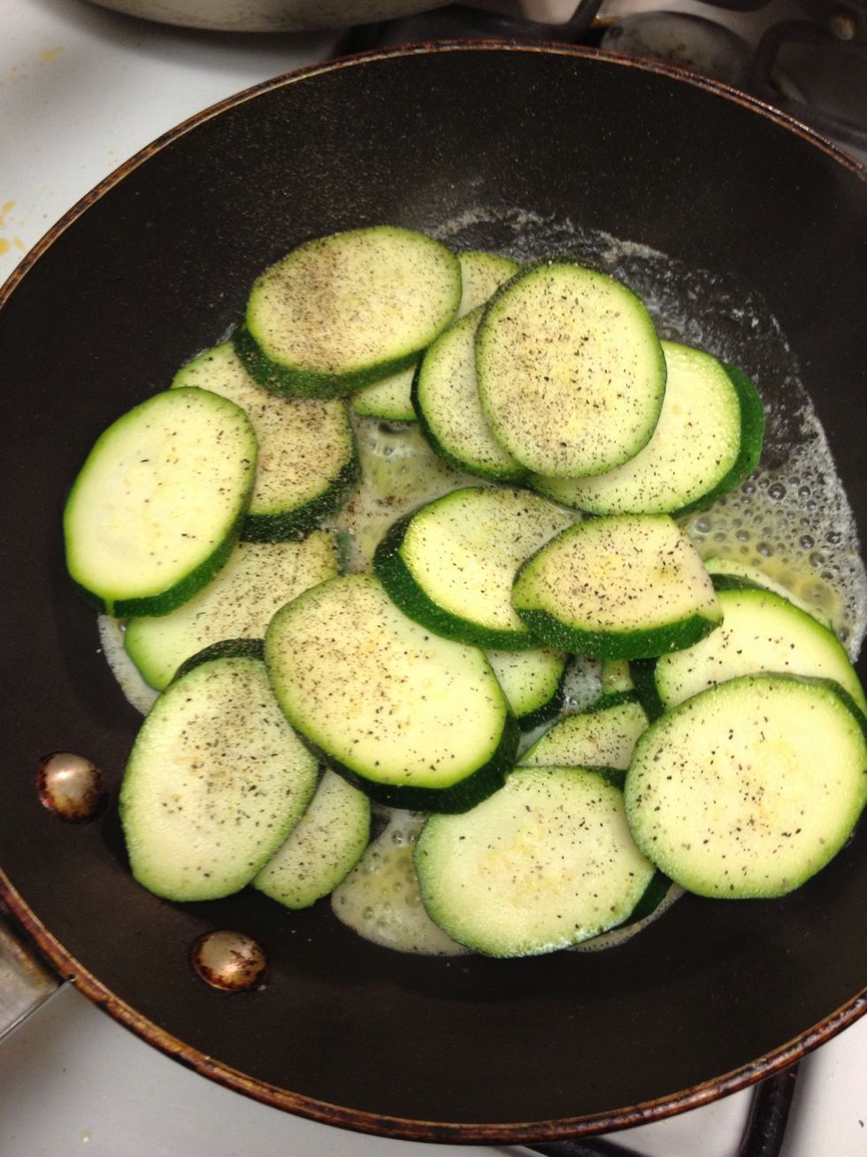 I like to saut\u00e9 zucchini to toss it into my pasta. Add some pepper and garlic salt (the one pictured on step 18)