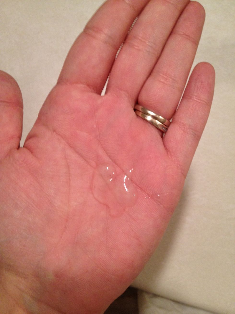 I like to start with clean, towel dried hair that is still about 70% wet, and add 2 pumps of my thickening serum, from root to tip.