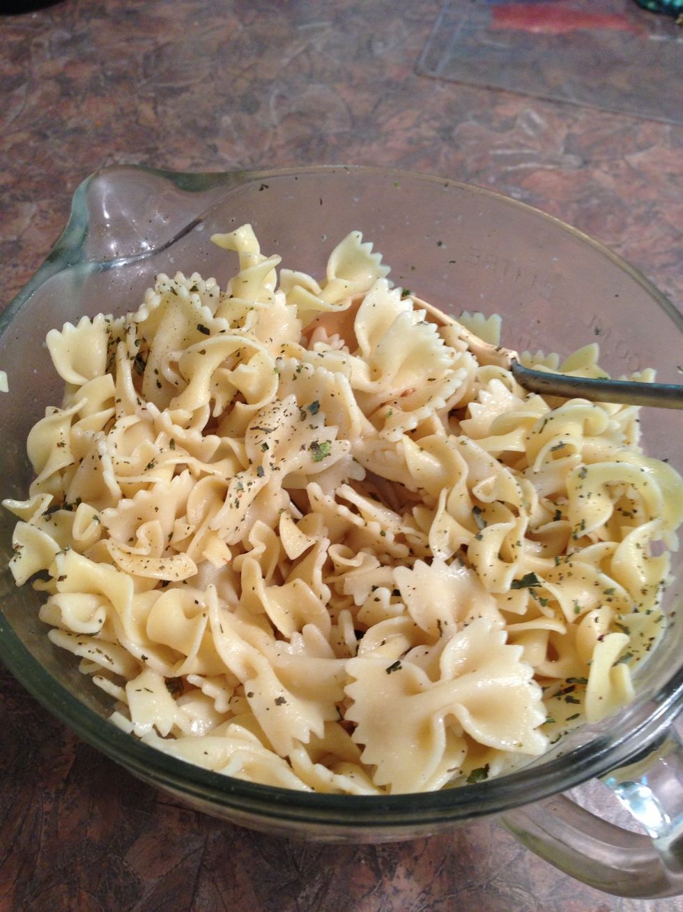 I like to stir in 1 tablespoon olive oil to avoid stickiness plus some basil flakes & a little salt & pepper to taste