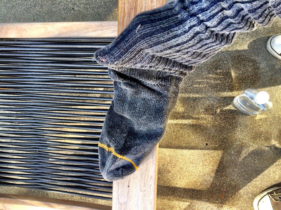 I like to use old socks. The fit right over your hands and allow for some easy manipulation into tight spots. Don't use dress socks though. Stick to cotton.