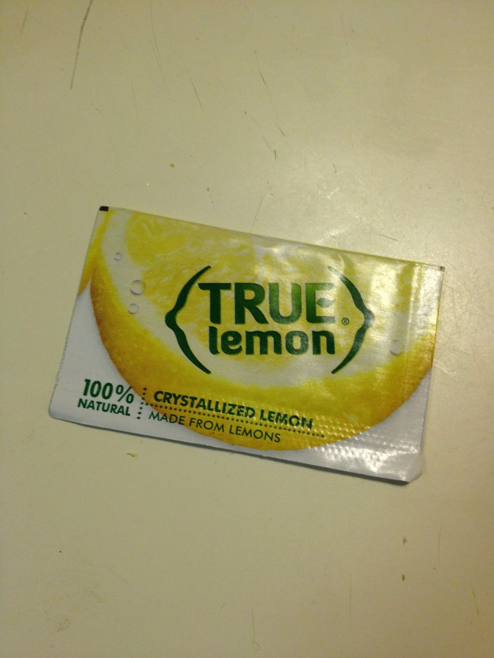 I like True Lemon. It's basically dehydrated lemon juice and keeps for years while juice doesn't. Use what you like. One packet or 1/2 Tablespoon of fresh or bottled juice.