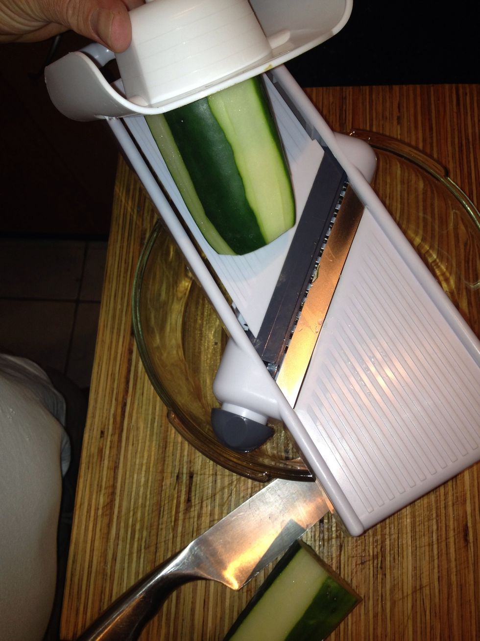 I like using my blade slicer but you can do this by hand