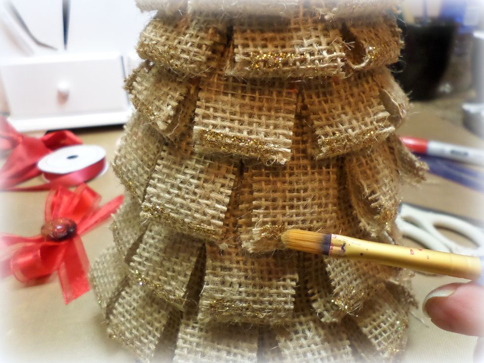 I like using the paint brush because you have more control of the glitter and you don't get big clumps. It goes exactly where you want it.