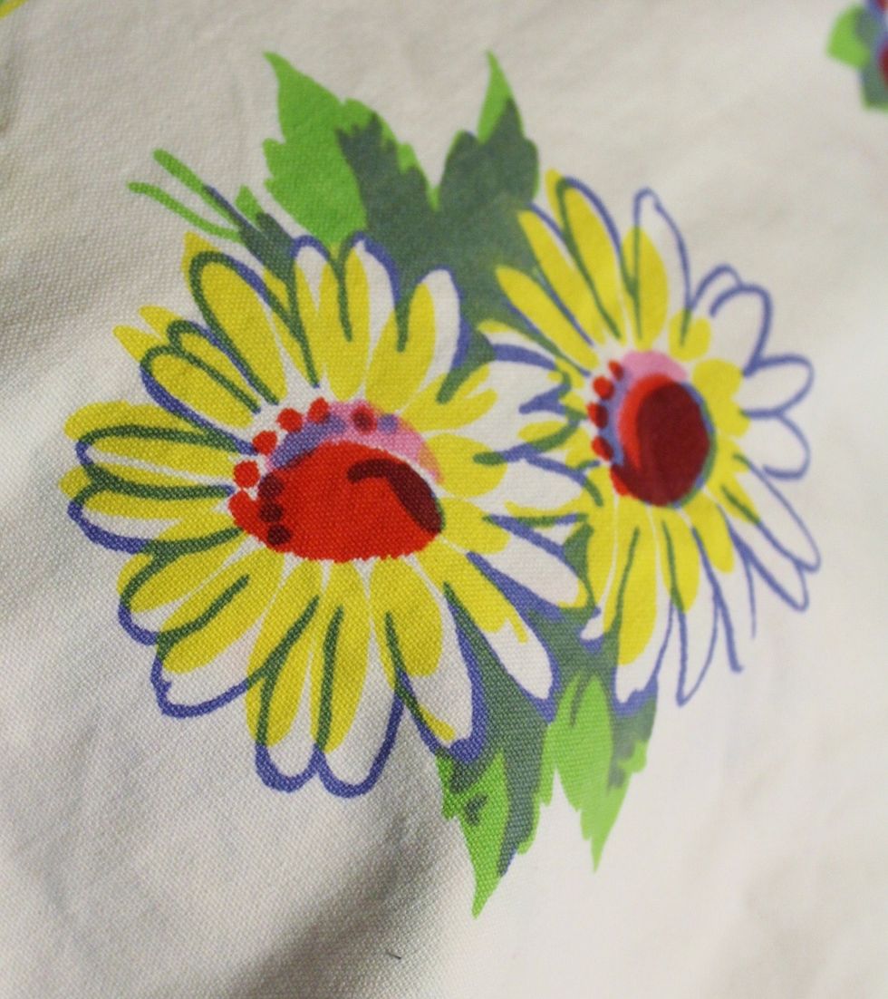 I liked the flowers on a vintage tablecloth I had and wanted to use the image to make a set of note cards...