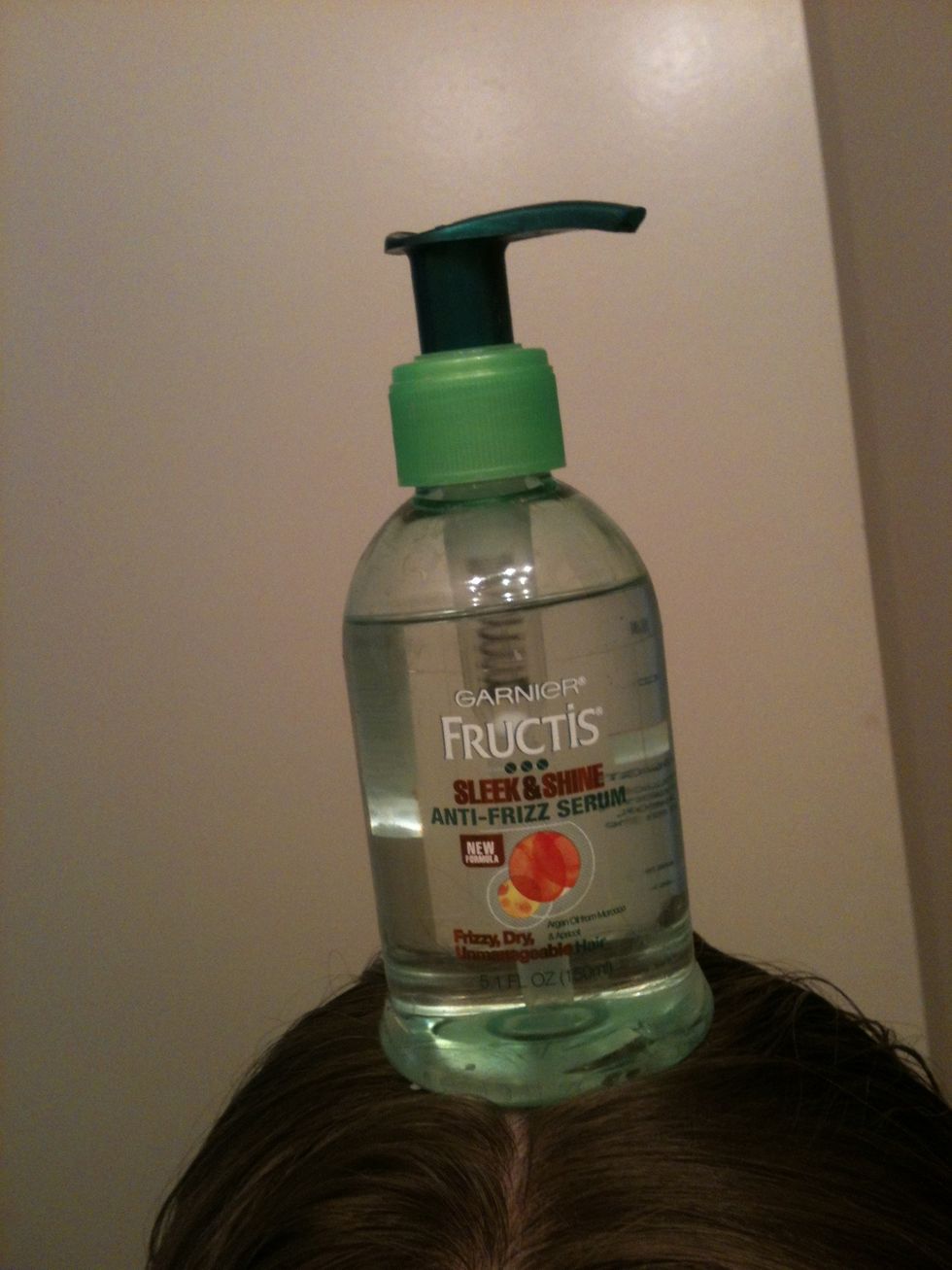 I live in HIGH humidity, so I also add anti-frizz serum to my damp hair. But this is probably a good idea wherever you live. And yes, the bottle is on my head.