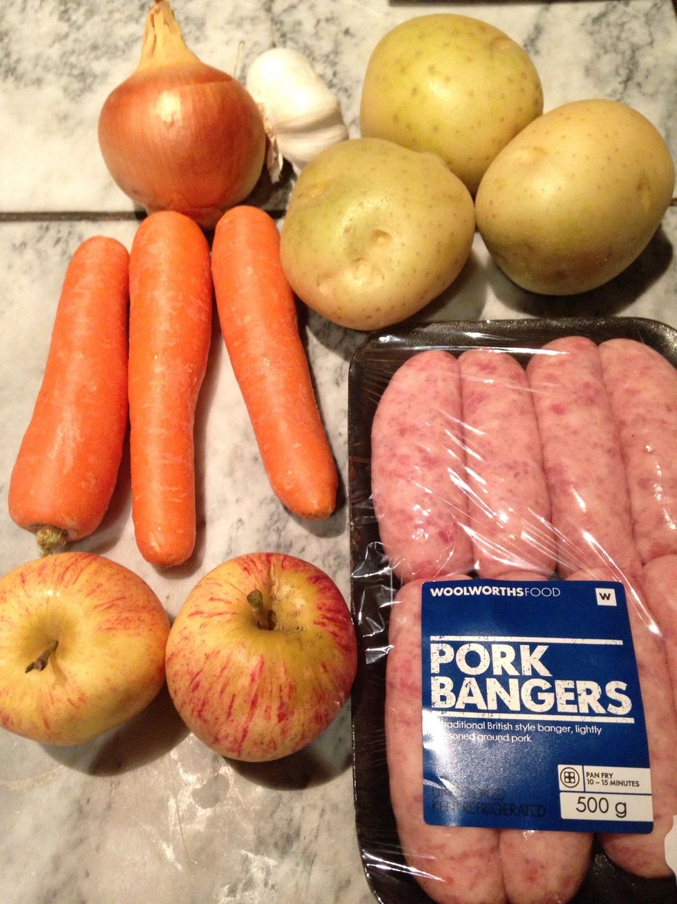 I love a simple meal like this. Especially bangers and mash. Call me English. You're probably wondering about the the apple potato mash. It's a stretch of the imagination I know. But bear with me ....