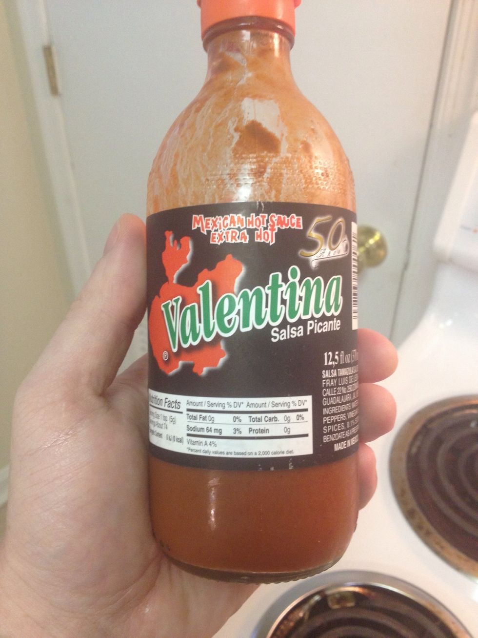 I love all kinds of hot sauce but this is my favorite for the greens. It's smoky, hot, and really cheap. You can buy it for a dollar or so at Walmart.