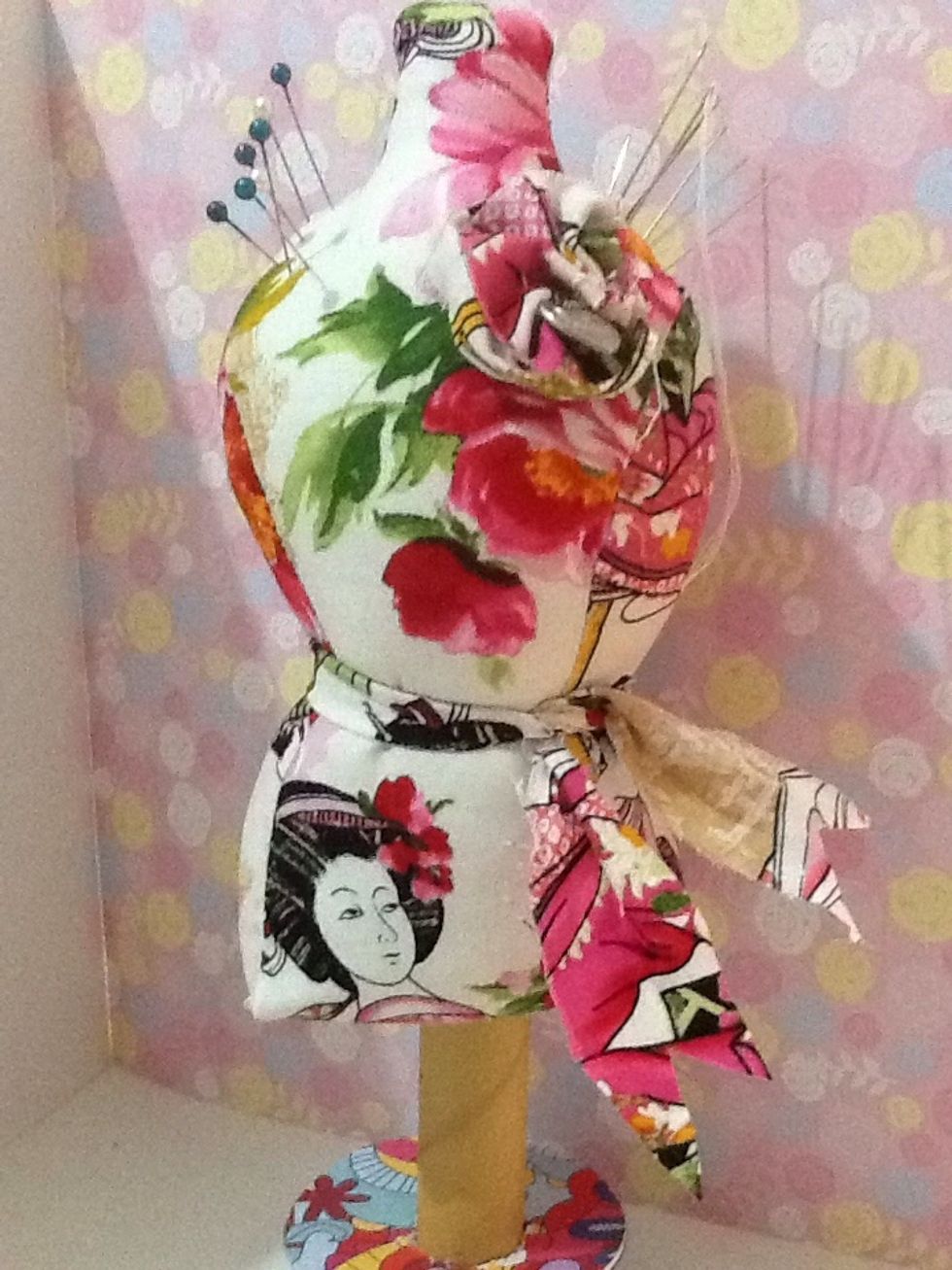 I love how mine turned out, though she's a bit of a chubby mannequin, she does the job, and the pins stay in really nicely. I'm considering adding beading around her neckline to jazz it up a bit.