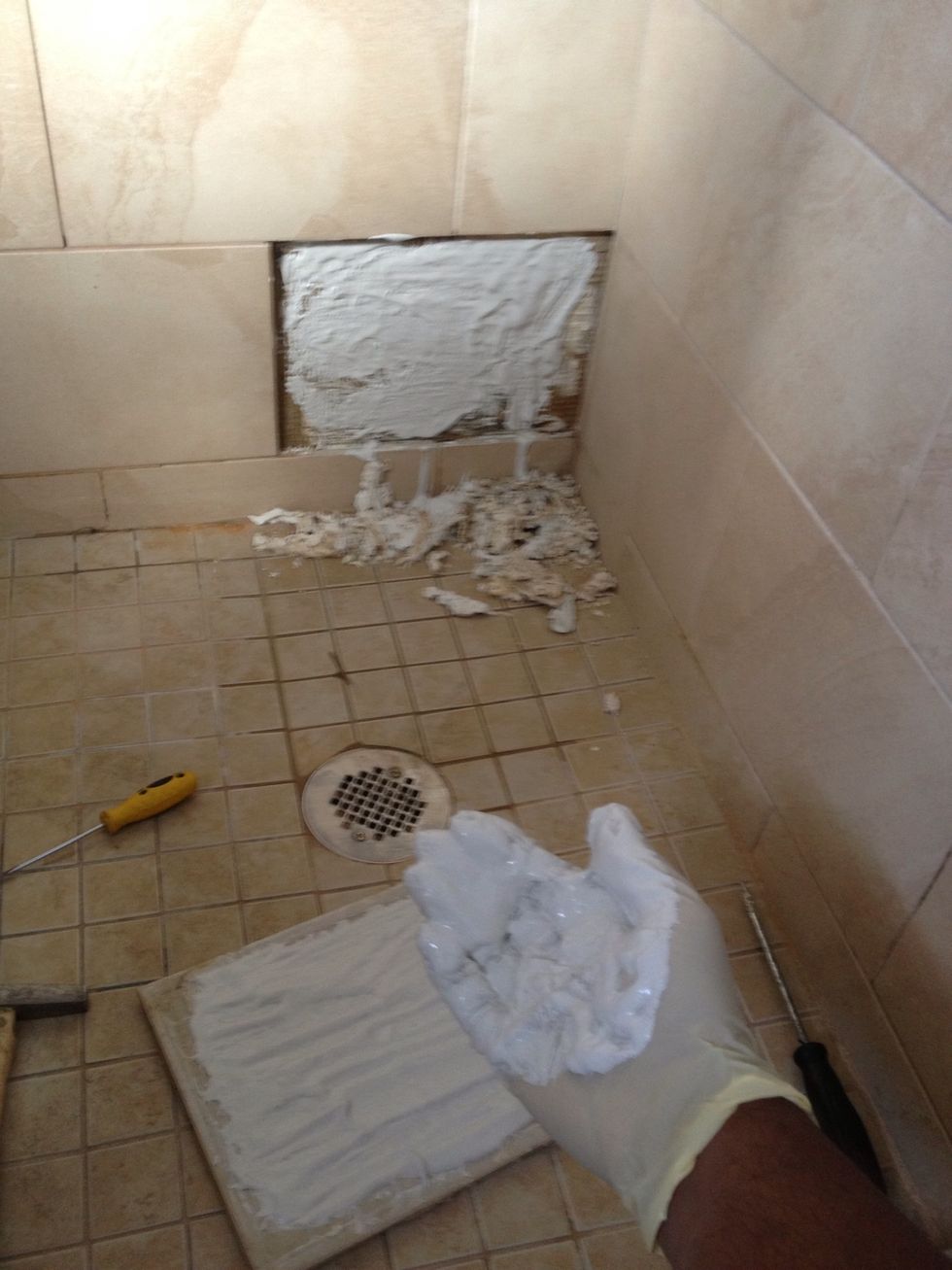 How to repair a loose shower tile B+C Guides