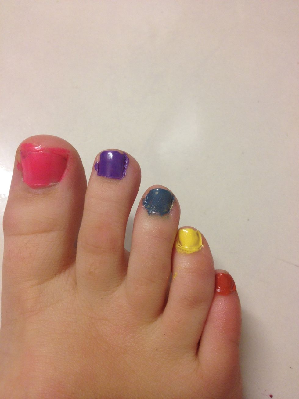 I'm doing reverse on this foot. I paint my nails the colour and put the white on with the donut