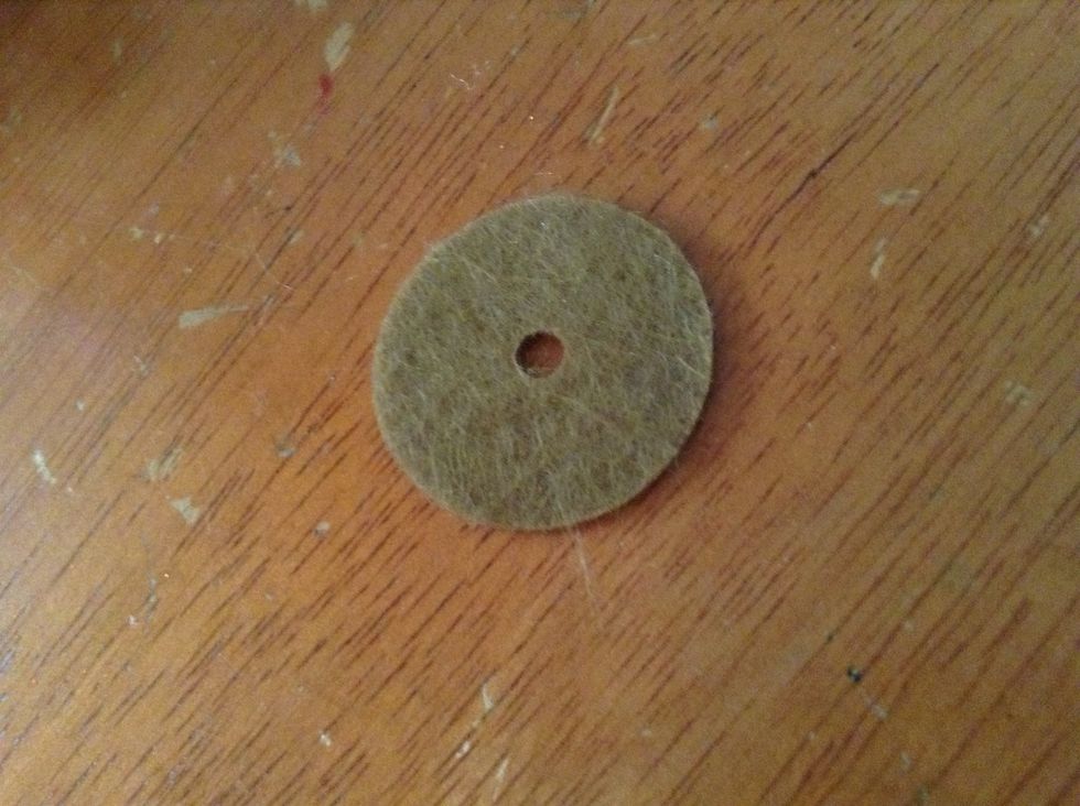 I'm going to make a rock belly, so I'm using a brown fabric circle