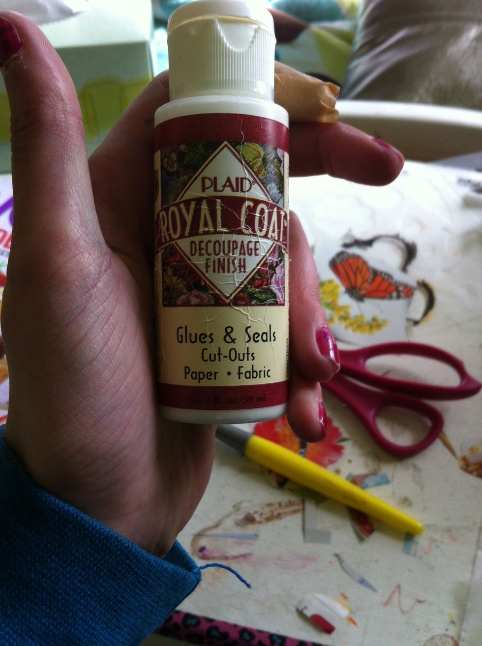 I'm going to use this brand of d\u00e9coupage. You can use mod podge or another sort if glue that dries clear.