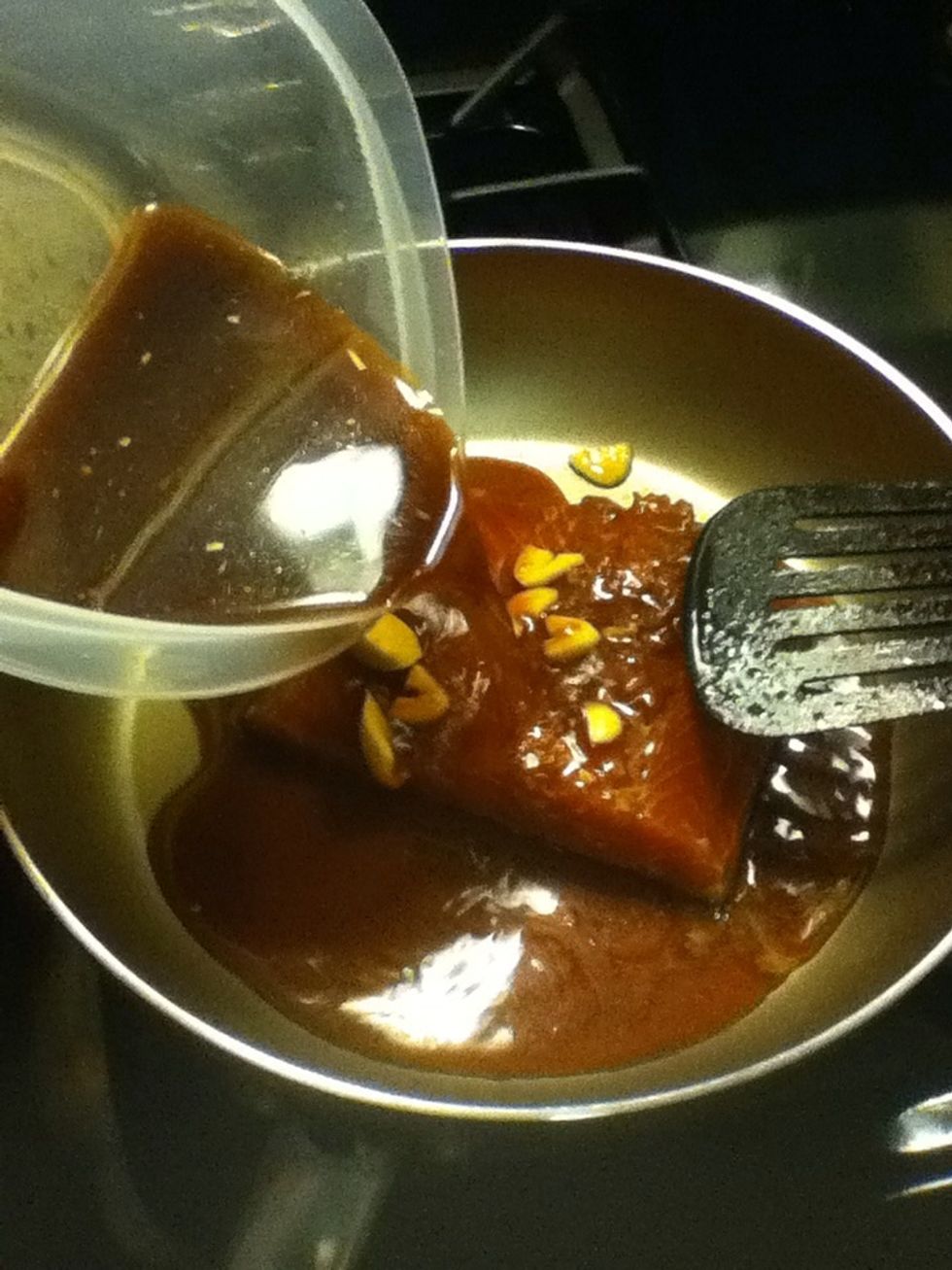 I'm gonna cook with the marinating sauce for more flavor but this is optional. I like to simmer with the juice.