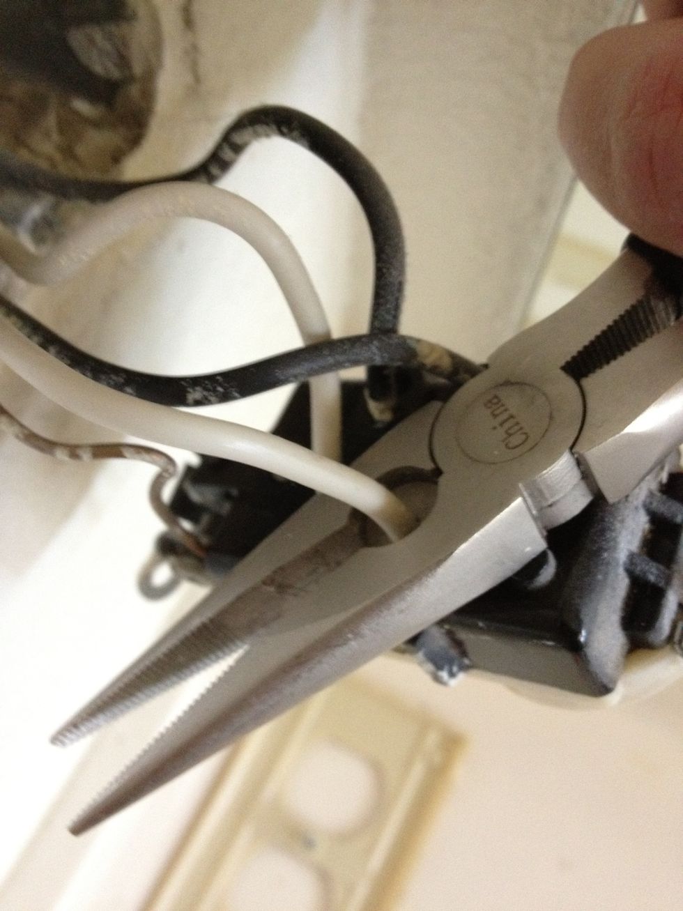 I'm lazy so I take my needlenose pliers and just cut the wires at the outlet instead of taking the time to unscrew and remove them.