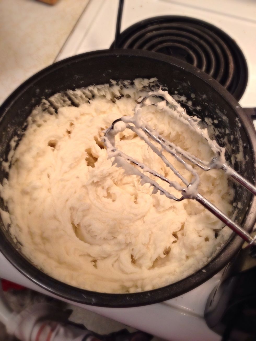I'm making mashed potatoes. Put some butter and milk in to make them irresistibly creamy! (Even better if you have whipping cream.)