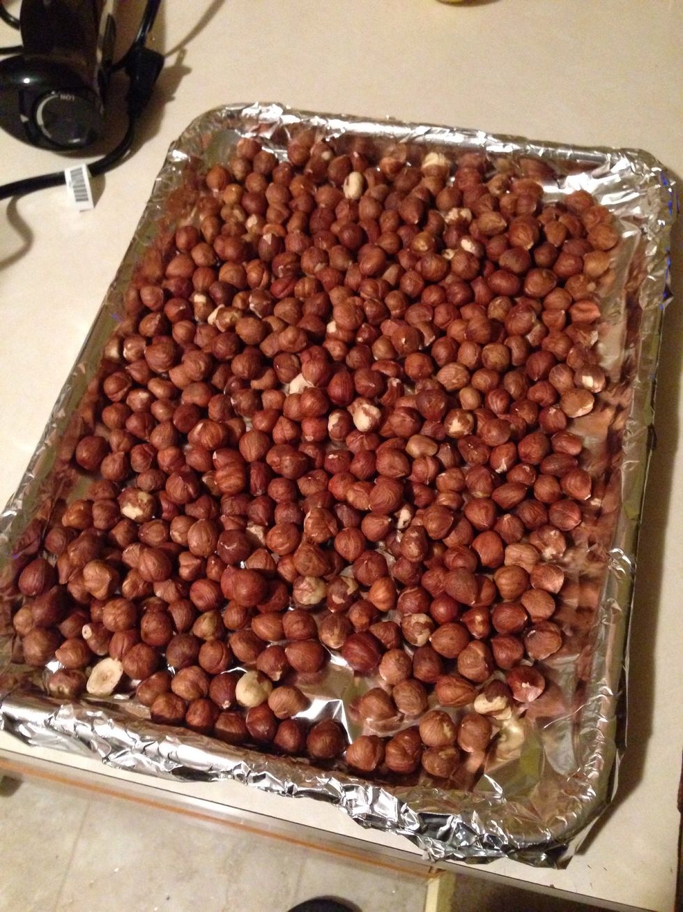 I'm making two types of truffles. One is hazelnut the other coconut. The hazelnut is more involved. Start by roasting some at 325F for 20 minutes