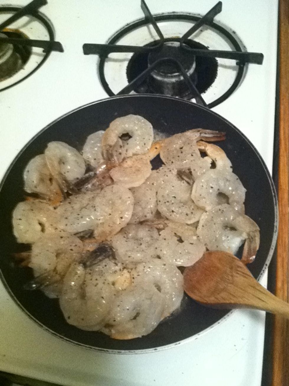 I'm realizing my skillet is too small for this much shrimp so I'm turning the heat up a bit and stirring more to make sure it all gets cooked.