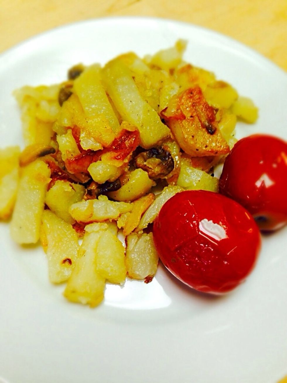 I'm Russian so I love it as is, with pickled tomatoes on a side