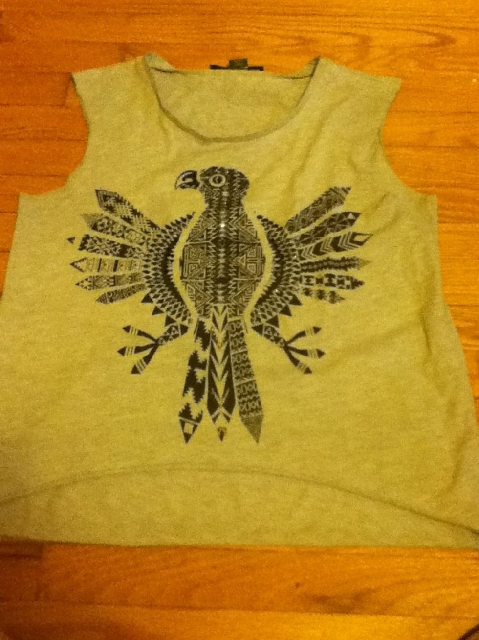 I'm using a high low tank top for this tutorial to show you that you can do it on any kind of shirt ! I laid my shirt out on a flat surface