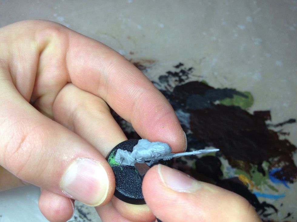 I'm using a pair of flat tweezers to flatten the putty even further, but it doesn't really need to be perfectly smooth.