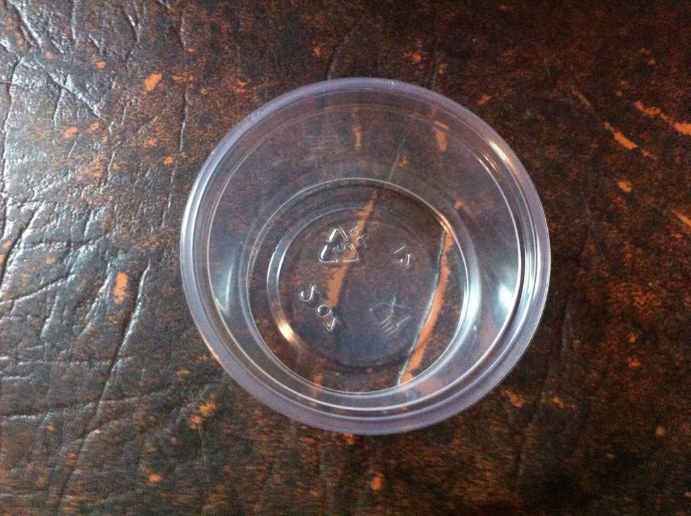 I'm using a very small disposable container to mix it in.