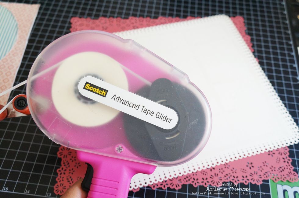 I'm using my 3M tape glider to adhere the layers down on the page...