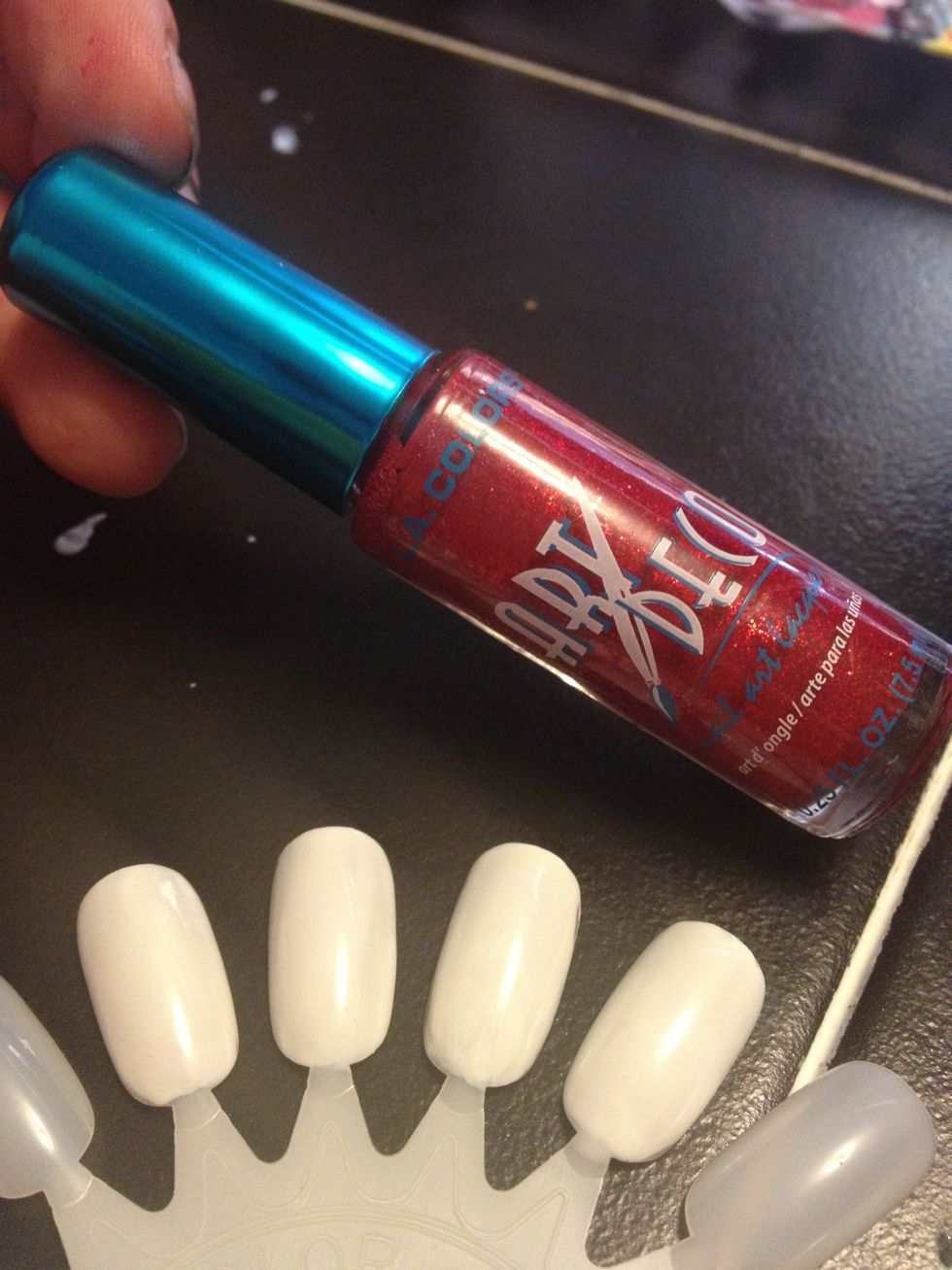 I'm using this polish, it doesn't have a name besides Red Glitter lol, these come with stripers as the paint brush, you can purchase them for only $1 at Dollar General
