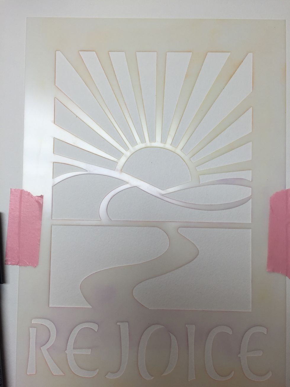 I'm using washi tape to secure the stencil