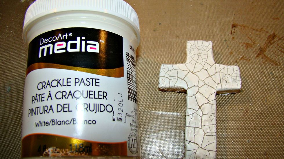 I made a cross from Air Dry Cay and once dried I gave it a good coat of crackle paste. Let this dry over night.
