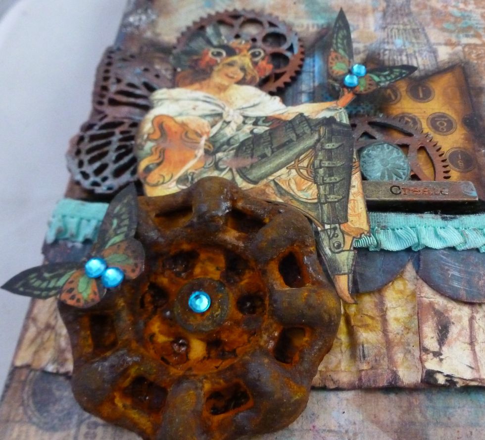 I made a faucet handle mold and then rusted it using Modern Master's Metal Effects Iron Paint and Rust activator. I so love this piece. I need to make more.