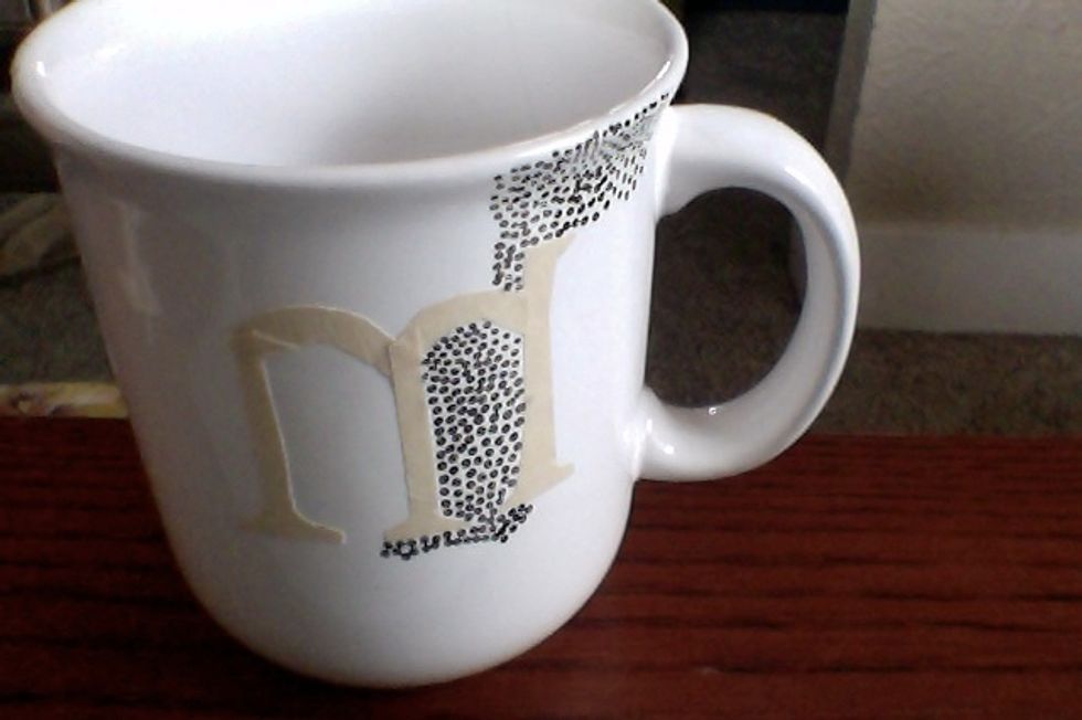 i made an 'm' with masking tape as a stencil