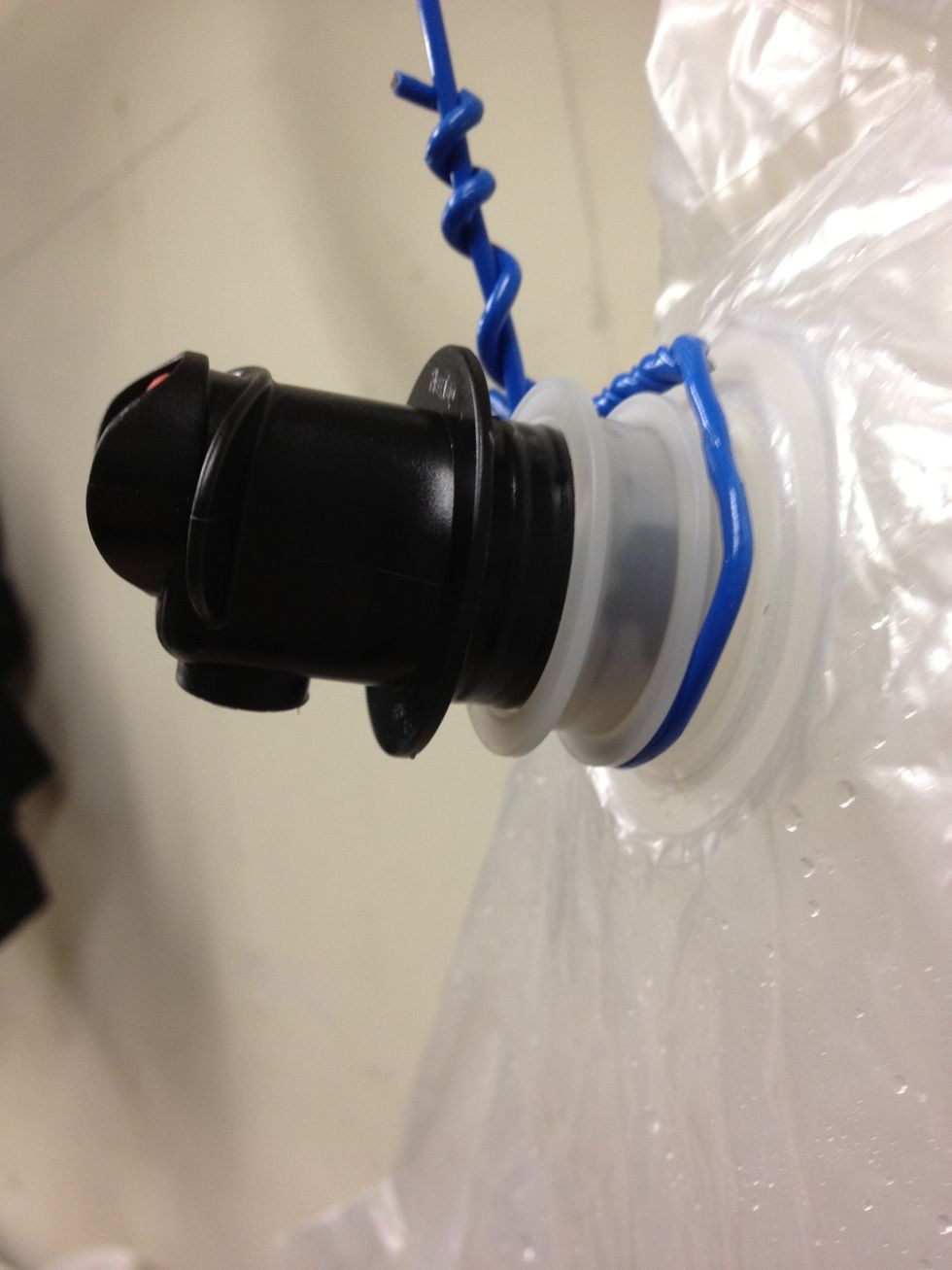 I made sure the hanger hung on the portion of the fitting on the bag instead of the valve itself. Just seemed a bit sturdier.